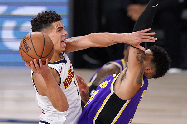 IM体育社区互动入口-法国男篮爆冷掘金，莫里斯高光表现